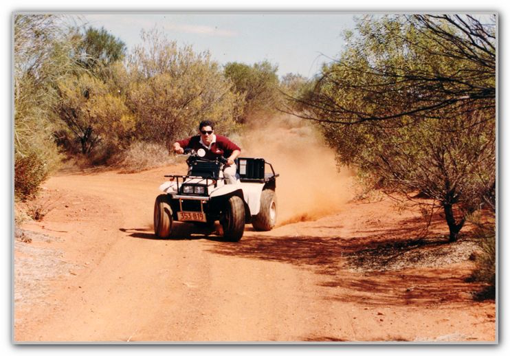 CJ riding quad bike at Ayers Rock